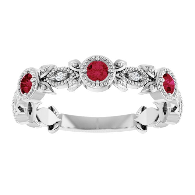 Round Ruby Accented Ring with Diamond Accents in Gold and Platinum