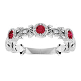 Round Ruby Accented Ring with Diamond Accents in Gold and Platinum