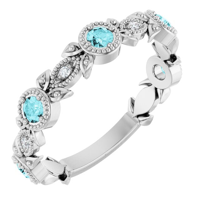 Round Blue Zircon & Diamond Accented Ring in Gold and Platinum