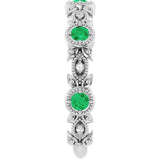 Round Emerald & Diamond Accented Ring in Gold and Platinum