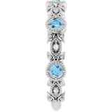 Round Aquamarine & Diamond Accented Ring in Gold and Platinum