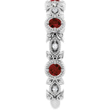 Round Mozambique Garnet & Diamond Ring in Gold and Platinum