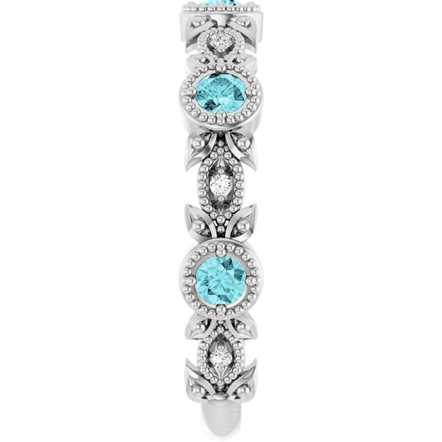 Round Blue Zircon & Diamond Accented Ring in Gold and Platinum