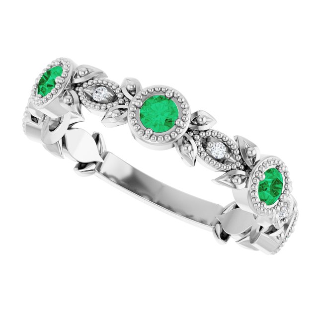 Round Emerald & Diamond Accented Ring in Gold and Platinum