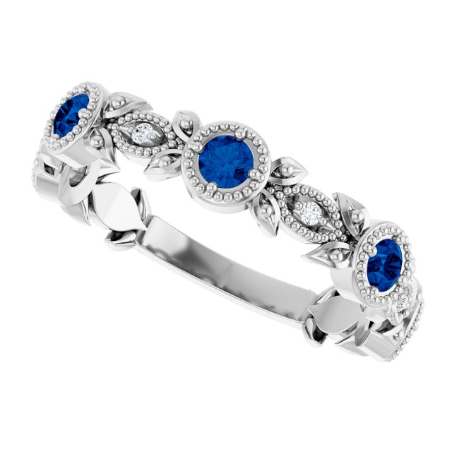 Round Blue Sapphire & Diamond Accented Ring in Gold and Platinum