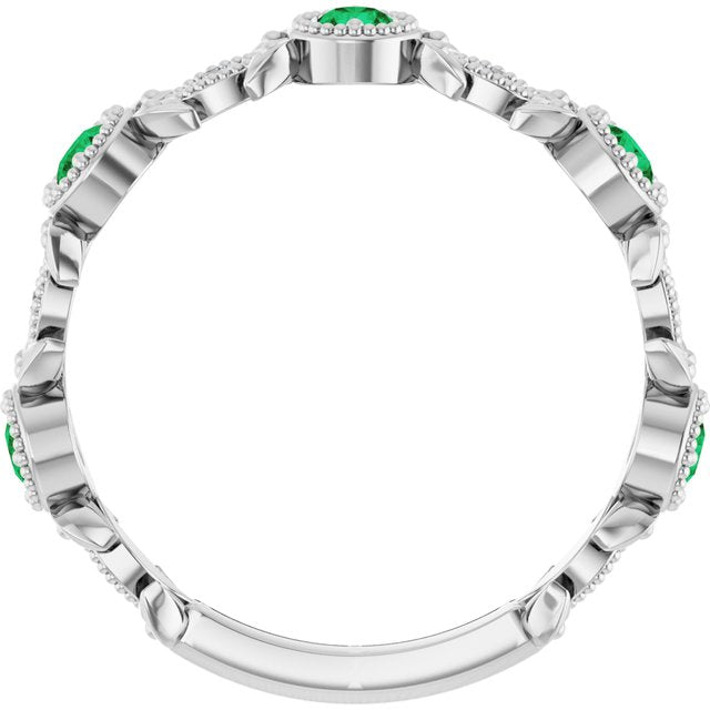 Round Emerald & Diamond Accented Ring in Gold and Platinum