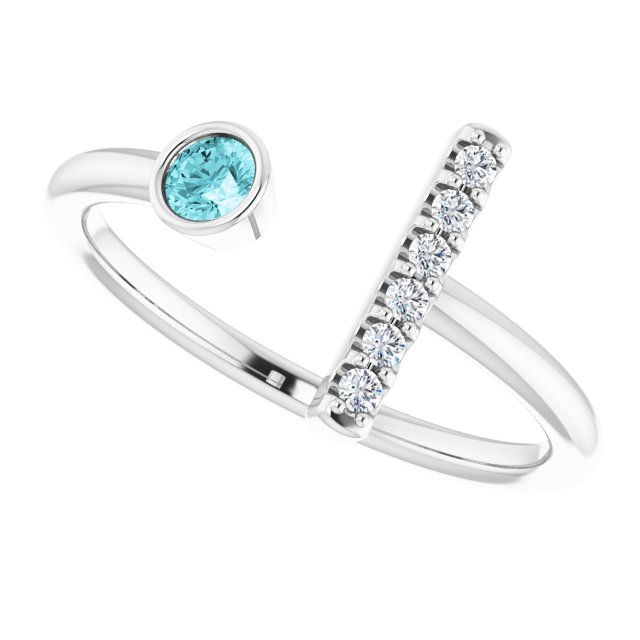Round Blue Zircon & Diamond Ring in Gold and Platinum