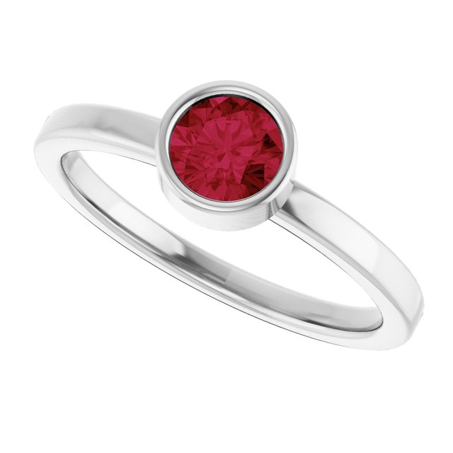 Round Ruby Solitaire Ring in Gold and Platinum