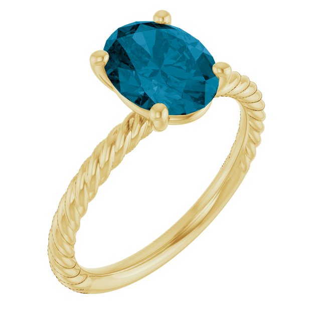 Oval London Blue Topaz Solitaire Ring in Gold