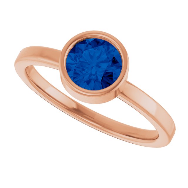 Round Blue Sapphire Solitaire Ring in Gold and Platinum