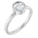 Round White Sapphire Solitaire Ring in Gold and Platinum