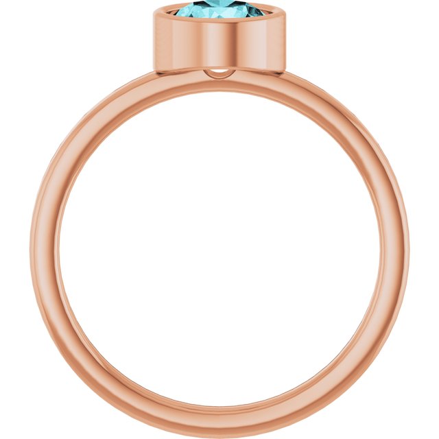 Round Blue Zircon Solitaire Ring in Gold and Platinum