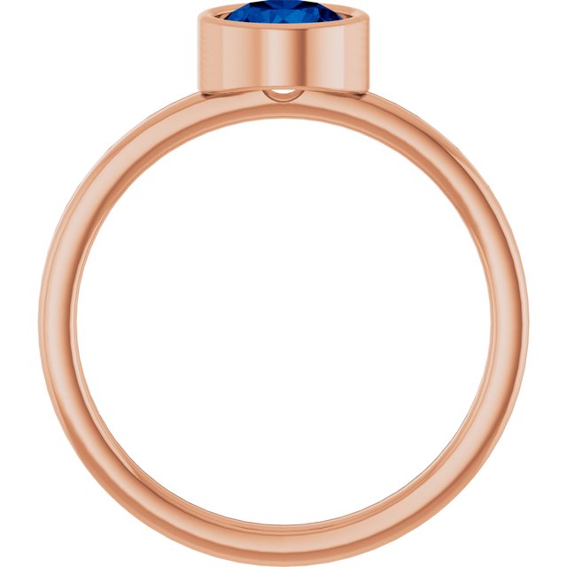 Round Blue Sapphire Solitaire Ring in Gold and Platinum