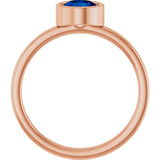 Round Blue Sapphire Solitaire Ring in Gold and Platinum