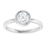 Round White Sapphire Solitaire Ring in Gold and Platinum