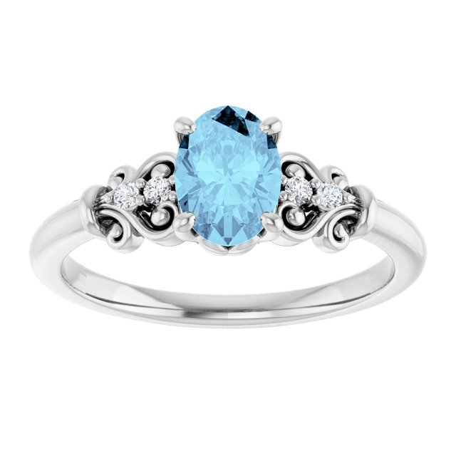Oval Aquamarine & Diamond Accented Ring in Gold and Platinum