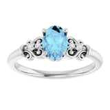 Oval Aquamarine & Diamond Accented Ring in Gold and Platinum