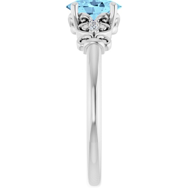 Oval Aquamarine & Diamond Accented Ring in Gold and Platinum
