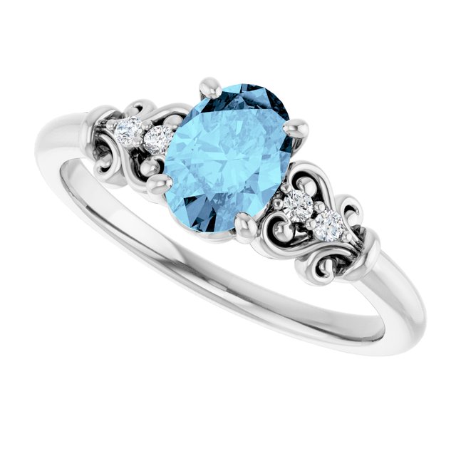 Oval Aquamarine & Diamond Accented Ring in Gold and Platinum
