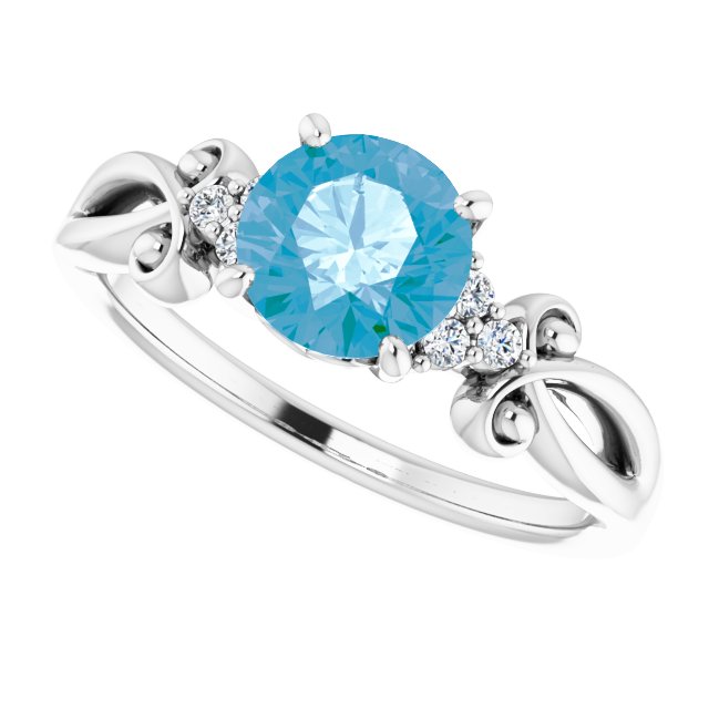 Round Blue Topaz & Diamond Accented Ring in Gold and Platinum