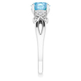 Round Blue Topaz & Diamond Accented Ring in Gold and Platinum