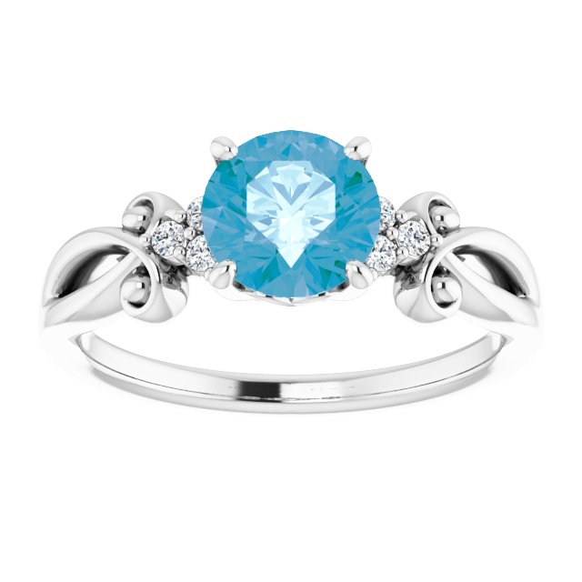 Round Blue Topaz & Diamond Accented Ring in Gold and Platinum