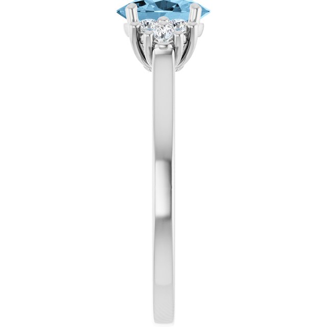 Oval Sky Blue Topaz & Diamond Accented Ring in Gold and Platinum