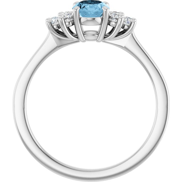 Oval Sky Blue Topaz & Diamond Accented Ring in Gold and Platinum