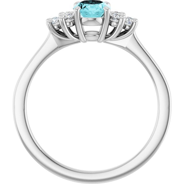 Oval Blue Zircon Accented Ring with Diamond Accents in Gold