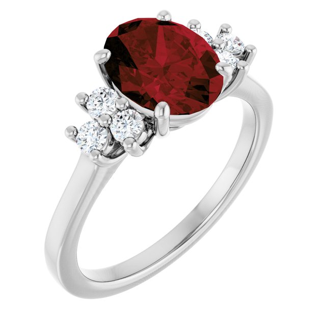 Oval Mozambique Garnet Accented Ring with Diamond Accents in Gold