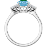 Oval Swiss Blue Topaz Accented Ring with Diamond Accents in Gold