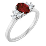 Oval Mozambique Garnet & Diamond Accented Ring in Gold and Platinum