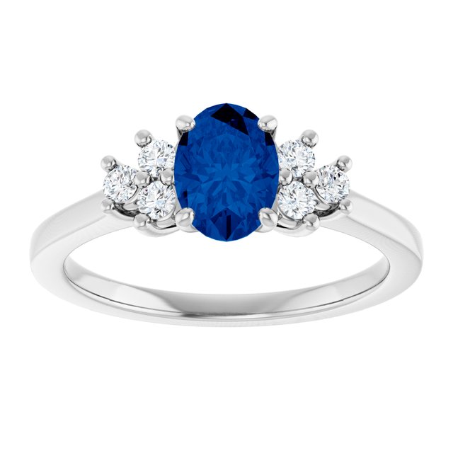 Oval Blue Sapphire Accented Ring with Diamond Accents in Gold
