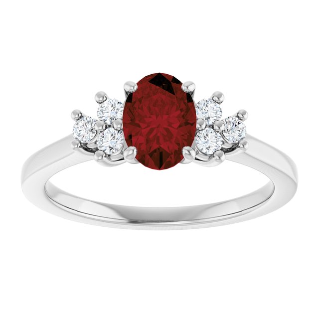Oval Mozambique Garnet & Diamond Accented Ring in Gold and Platinum