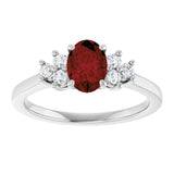 Oval Mozambique Garnet & Diamond Accented Ring in Gold and Platinum
