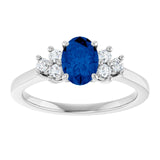 Oval Blue Sapphire Accented Ring with Diamond Accents in Gold