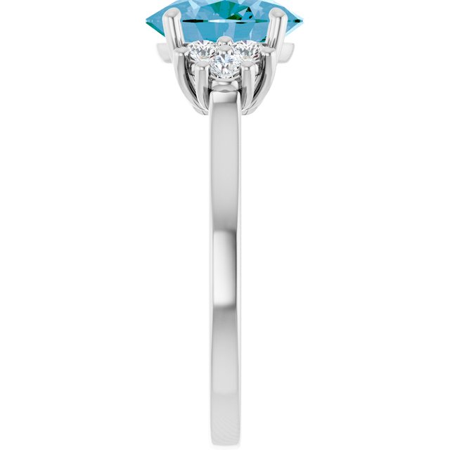 Oval Swiss Blue Topaz Accented Ring with Diamond Accents in Gold