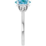 Oval Swiss Blue Topaz Accented Ring with Diamond Accents in Gold