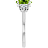 Oval Peridot Accented Ring with Diamond Accents in Gold