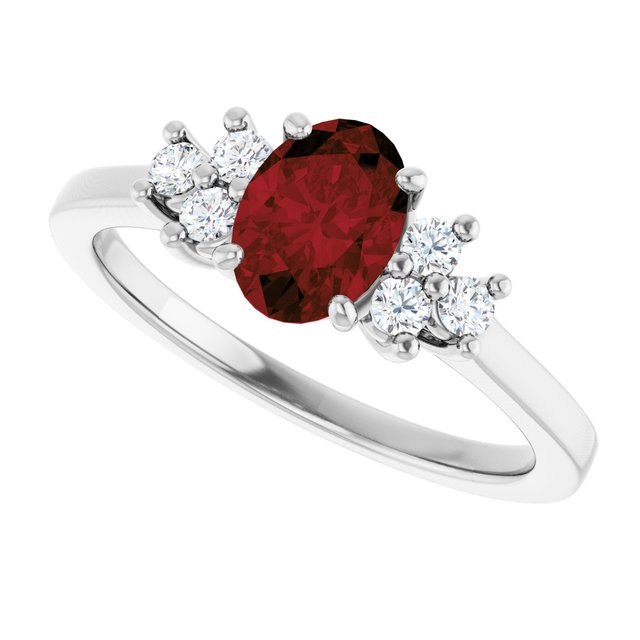 Oval Mozambique Garnet & Diamond Accented Ring in Gold and Platinum