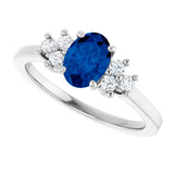 Oval Blue Sapphire Accented Ring with Diamond Accents in Gold