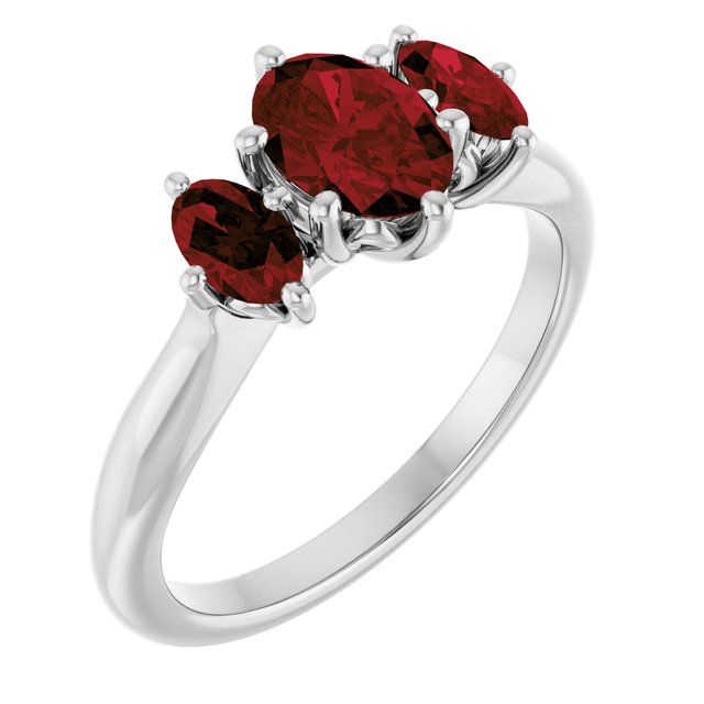 Oval Mozambique Garnet Three Stone Ring in Gold and Platinum