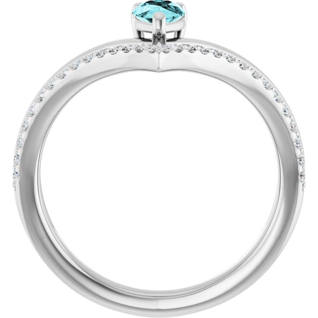 Pear Blue Zircon & Diamond Negative Space Ring in Gold and Platinum