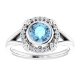 Round Aquamarine & Diamond Halo Ring in Gold and Platinum