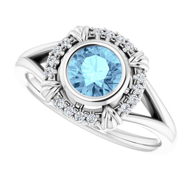Round Aquamarine & Diamond Halo Ring in Gold and Platinum
