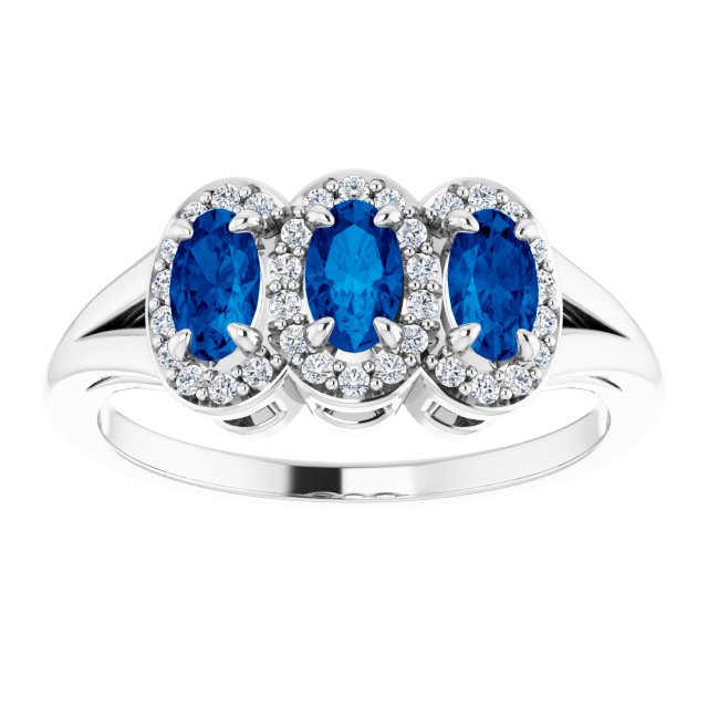 Oval Blue Sapphire & Diamond Three Stone Ring in Gold and Platinum