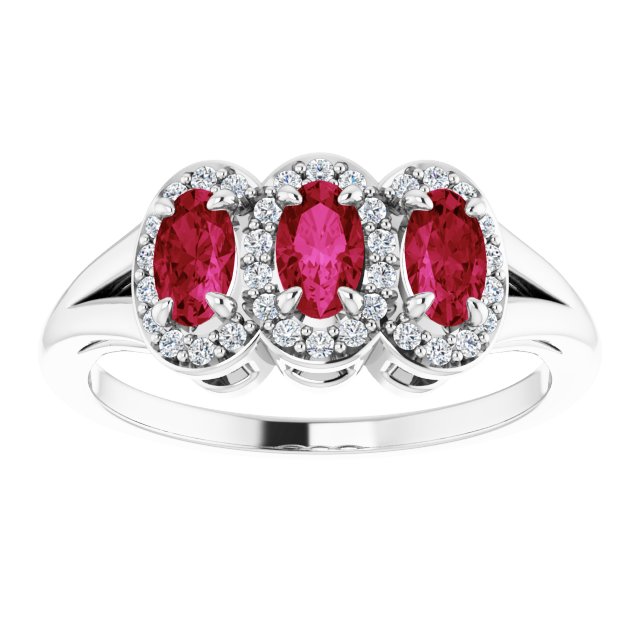 Oval Ruby & Diamond Three Stone Ring in Gold and Platinum