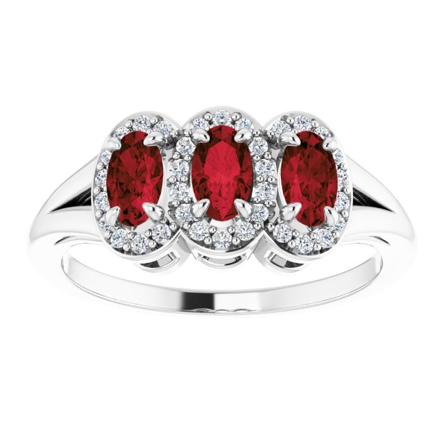 Oval Mozambique Garnet & Diamond Ring in Gold and Platinum