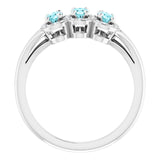 Oval Blue Zircon & Diamond Three Stone Ring in Gold and Platinum