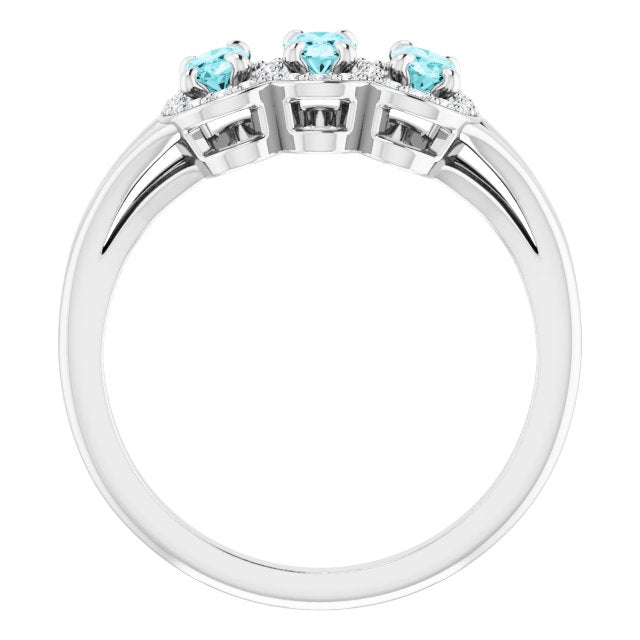 Oval Blue Zircon & Diamond Three Stone Ring in Gold and Platinum